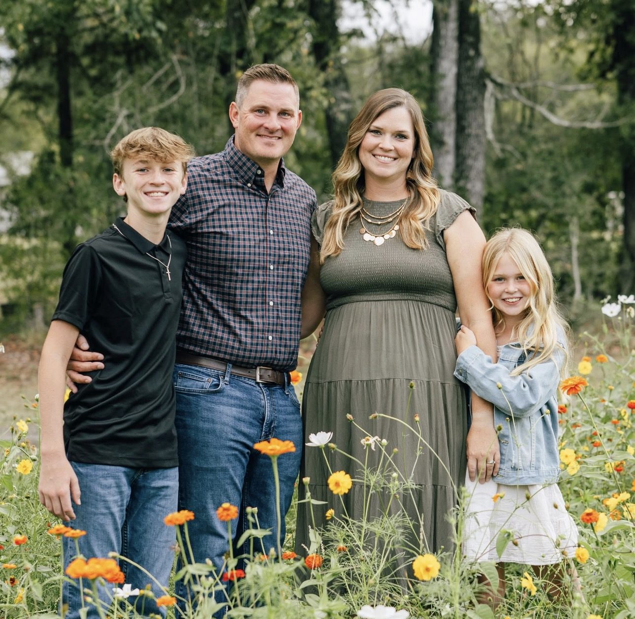 Coach Morris with his wife and children