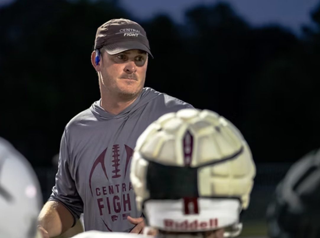 Coach Morris on the sideline under the lights