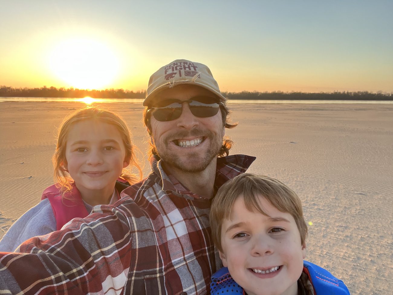 Coach Simoneaux and kids at sunset