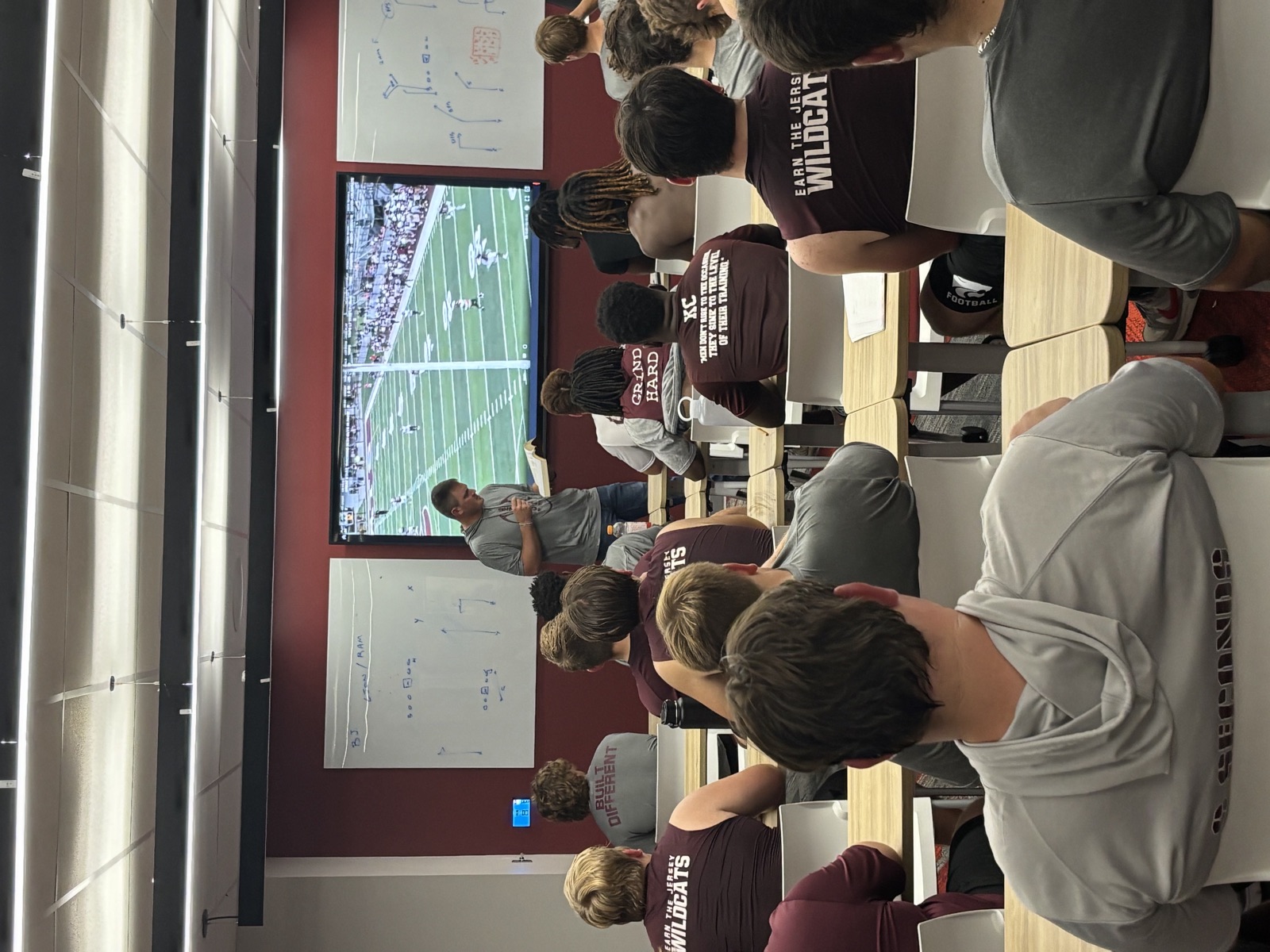 Coach Simoneaux and Coach Morris addressing an audience